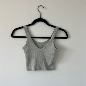 Out from under cropped tank top